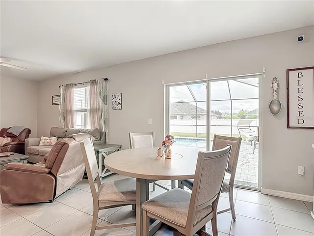 a kitchen with stainless steel appliances a refrigerator and a stove top oven