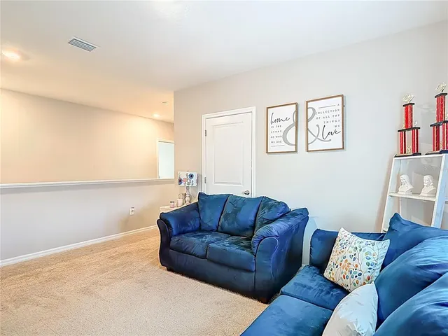 a view of a swimming pool with a backyard