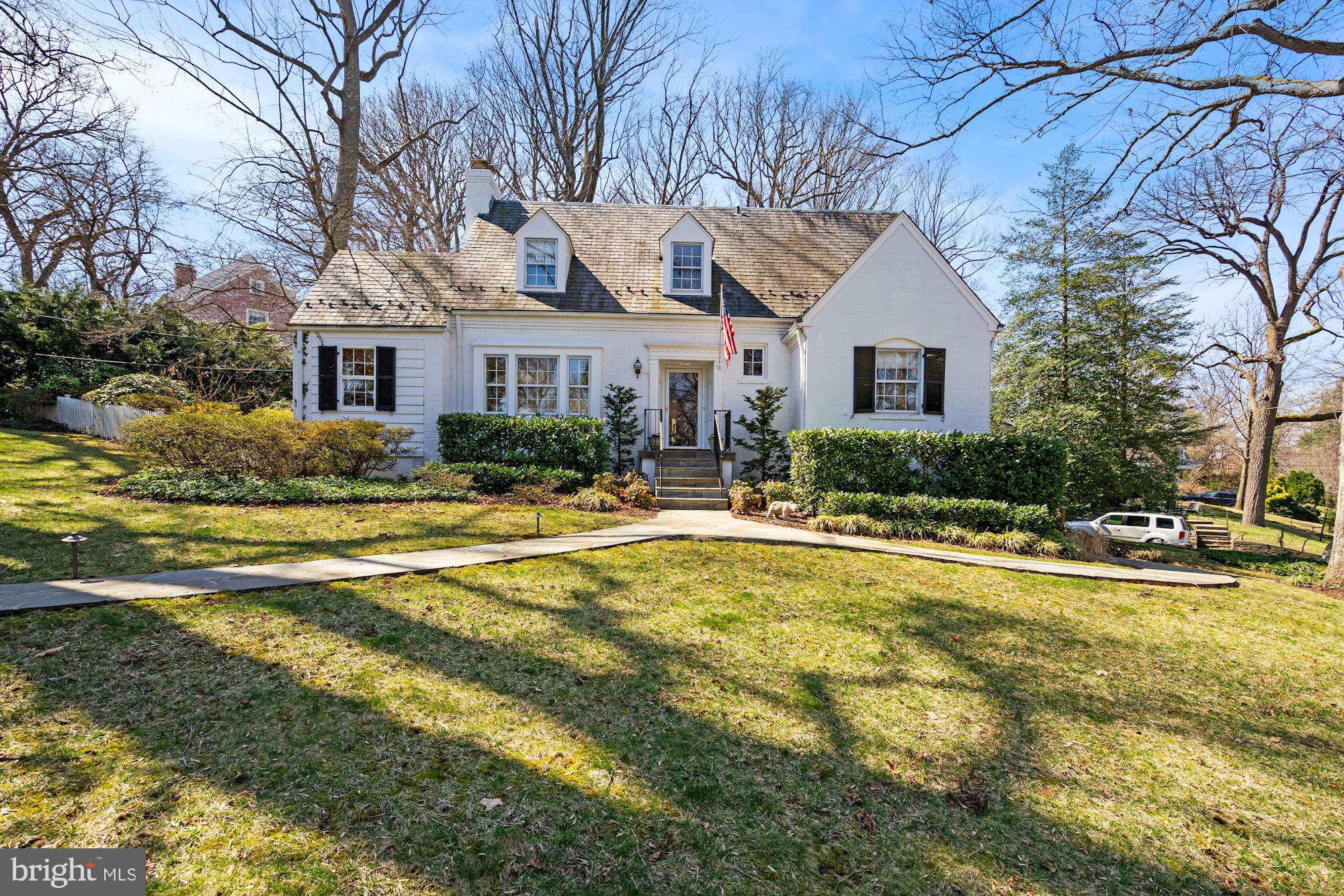 Brick front elevation w/slate roof & reverse gable