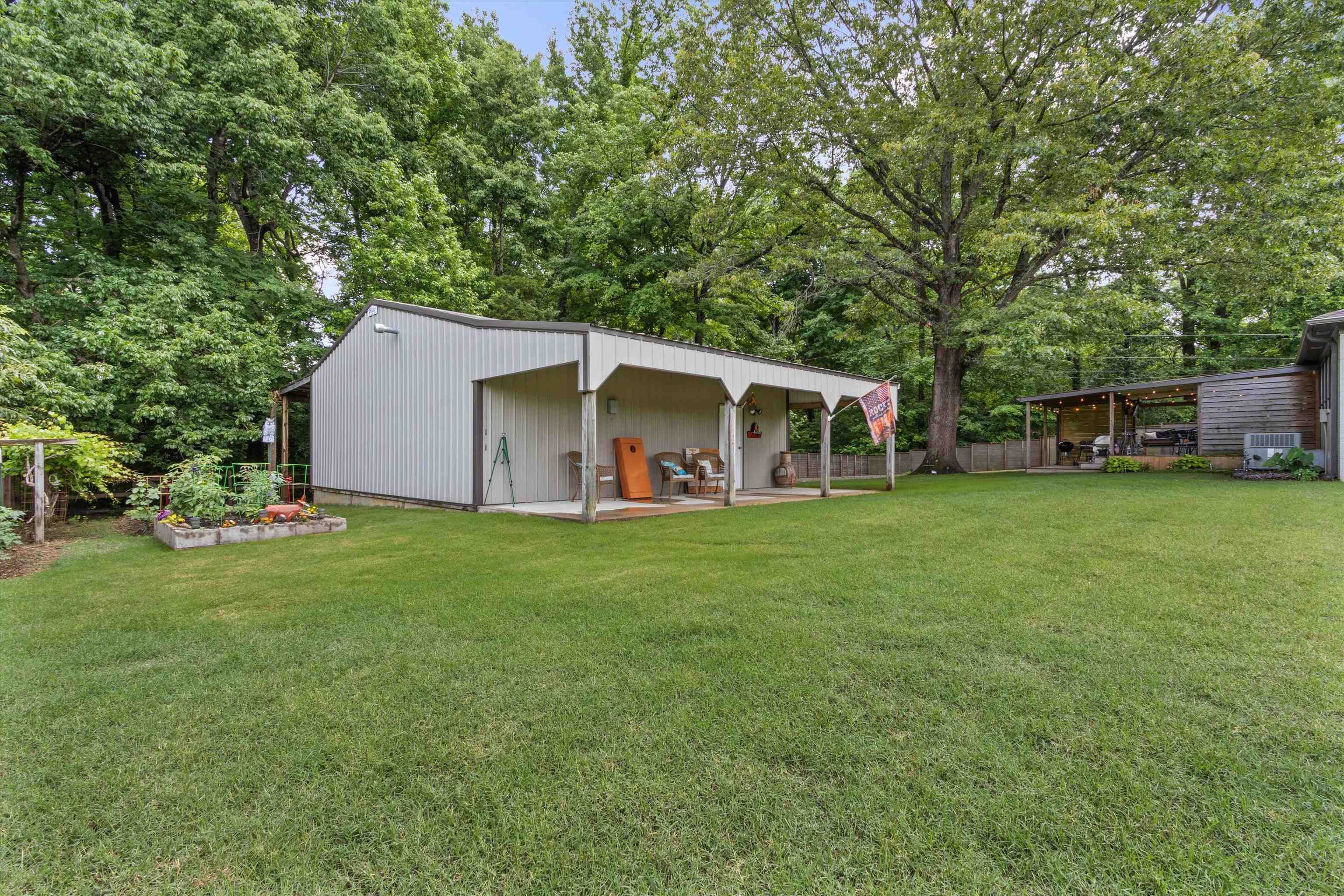 4500 Drummonds Road Drummonds, TN 38023 - Photo 21 of 29 a view of a house with a backyard