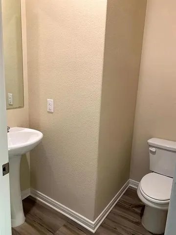 a bathroom with a sink and a toilet