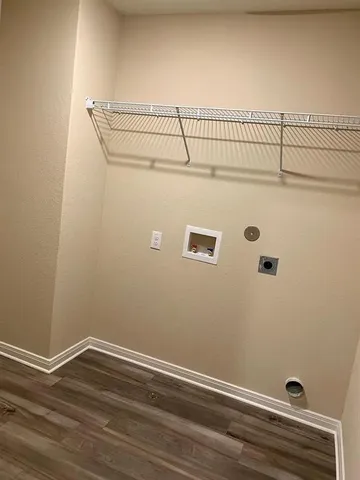 a view of a room with racks on the wall