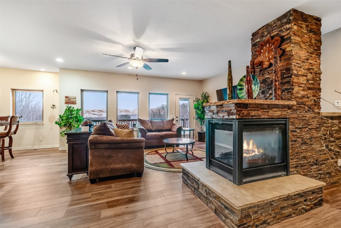 53 Anhinga Road Como, CO 80432 - Photo 12 of 45 a living room with furniture and a fireplace