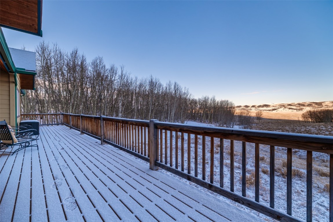 53 Anhinga Road Como, CO 80432 - Photo 36 of 45 a balcony with wooden floor and fence