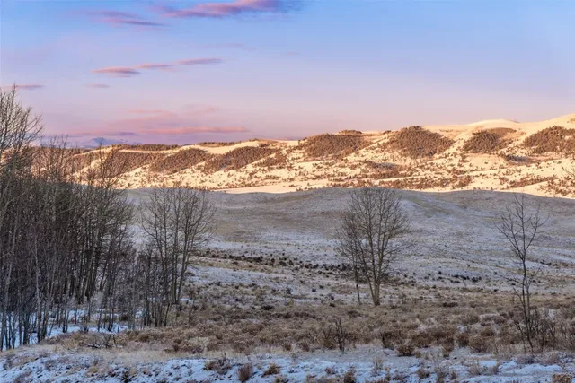 a view of mountain view with mountains in the background