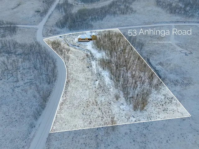 a view of a wooden floor with a yard