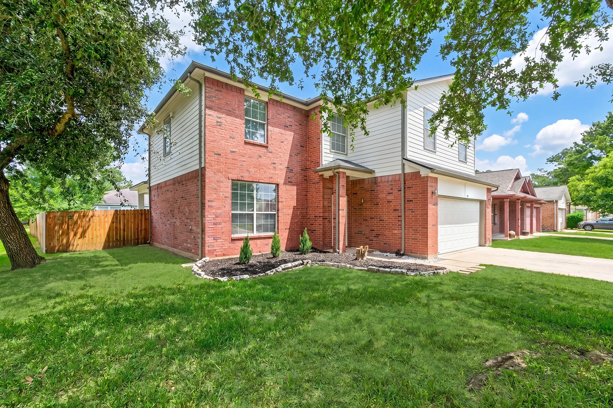 918 Ivycroft Lane Spring, TX 77373 - Photo 3 of 33 a front view of a house with a yard