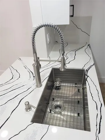 a view of staircase with a rug