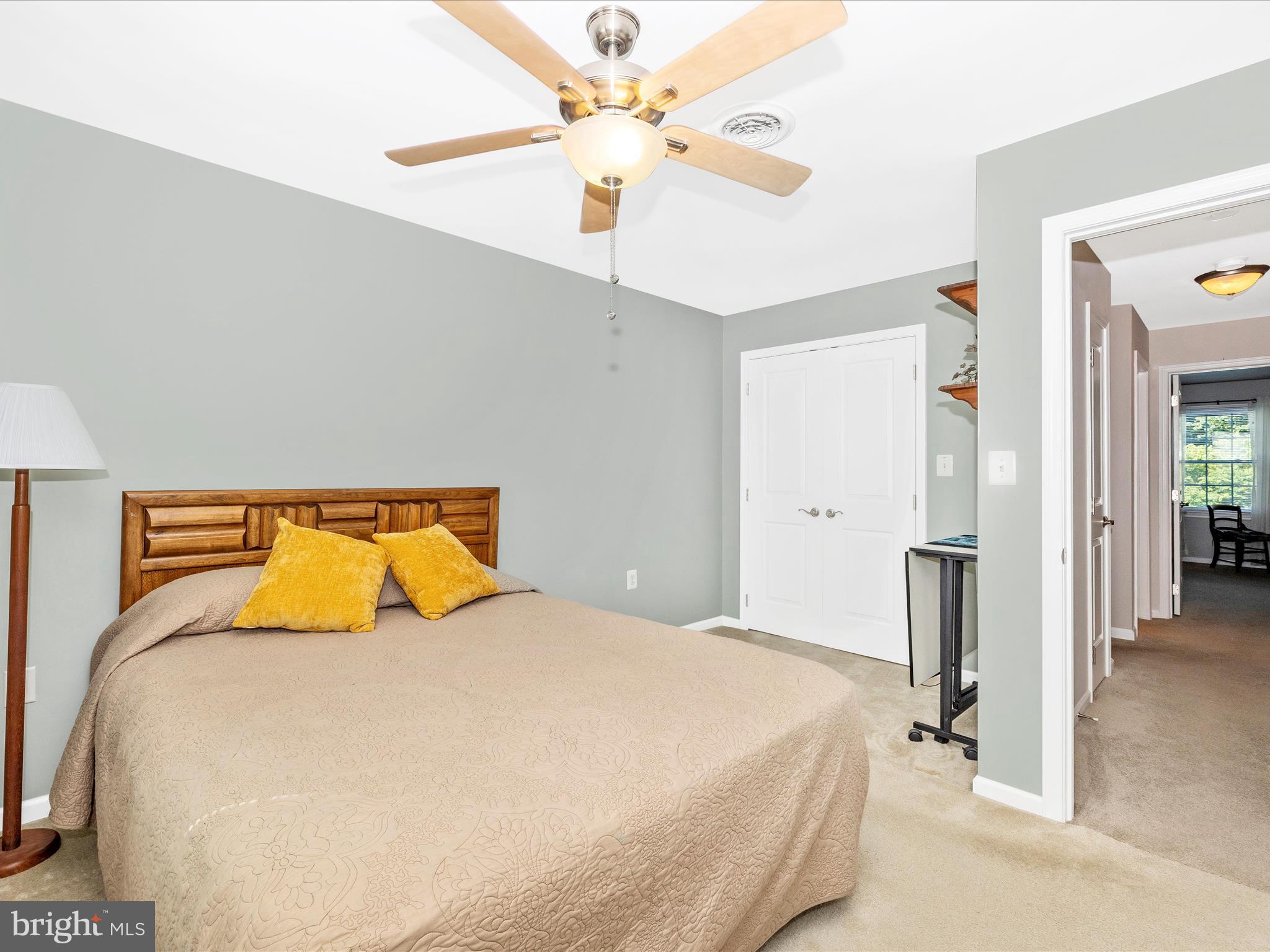 8102 Glendale Drive Frederick, MD 21702 - Photo 46 of 61 a bedroom with a bed and ceiling fan
