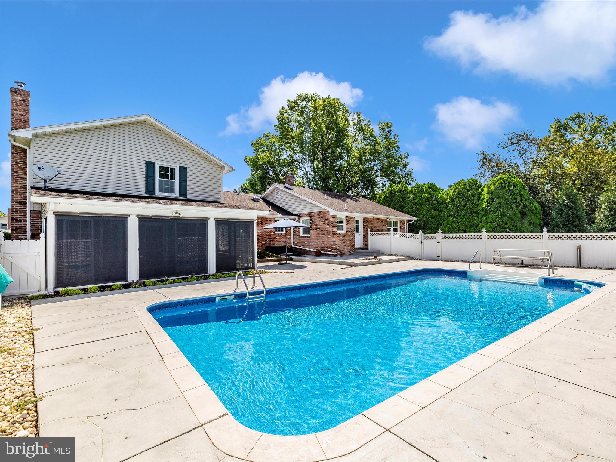 8102 Glendale Drive Frederick, MD 21702 - Photo 58 of 61 a view of house with swimming pool outdoor seating