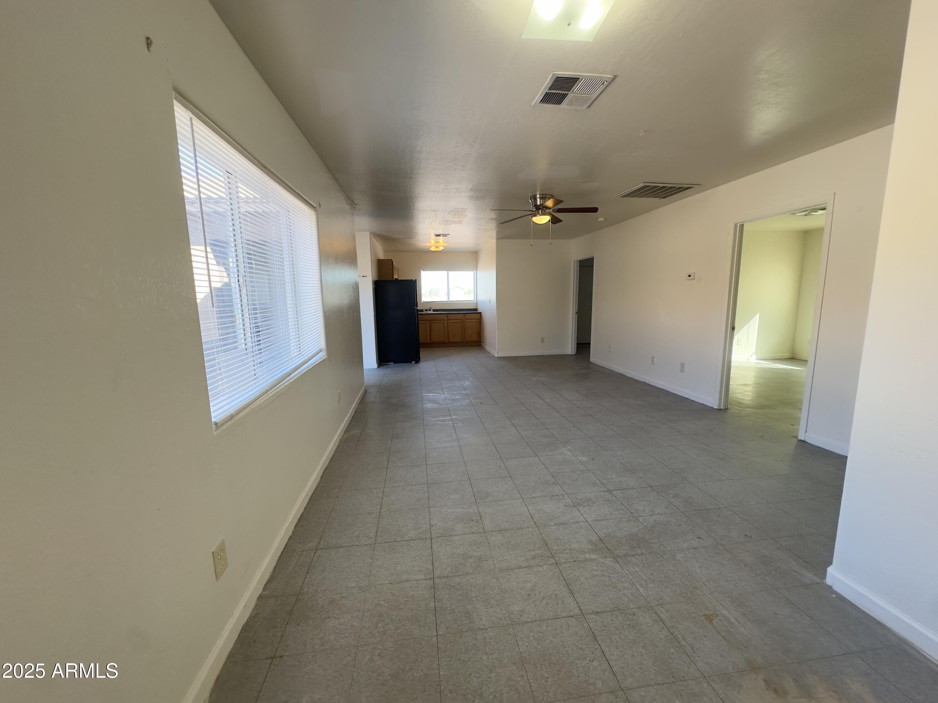 1228 East Apache Street, Unit 2 Phoenix, AZ 85034 - Photo 15 of 15 a view of a hallway to rooms