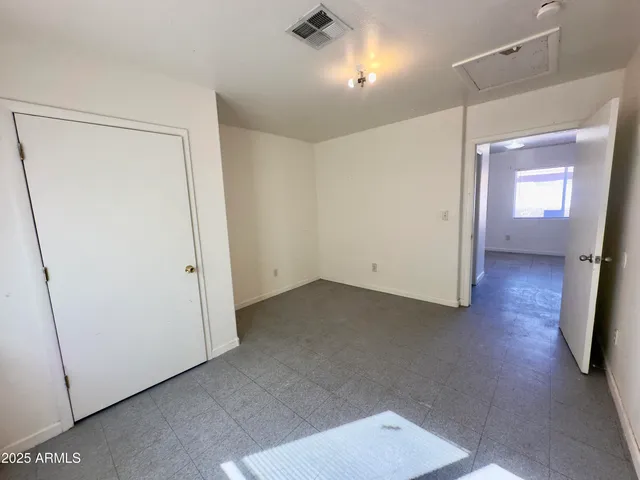 a view of a room with a hallway