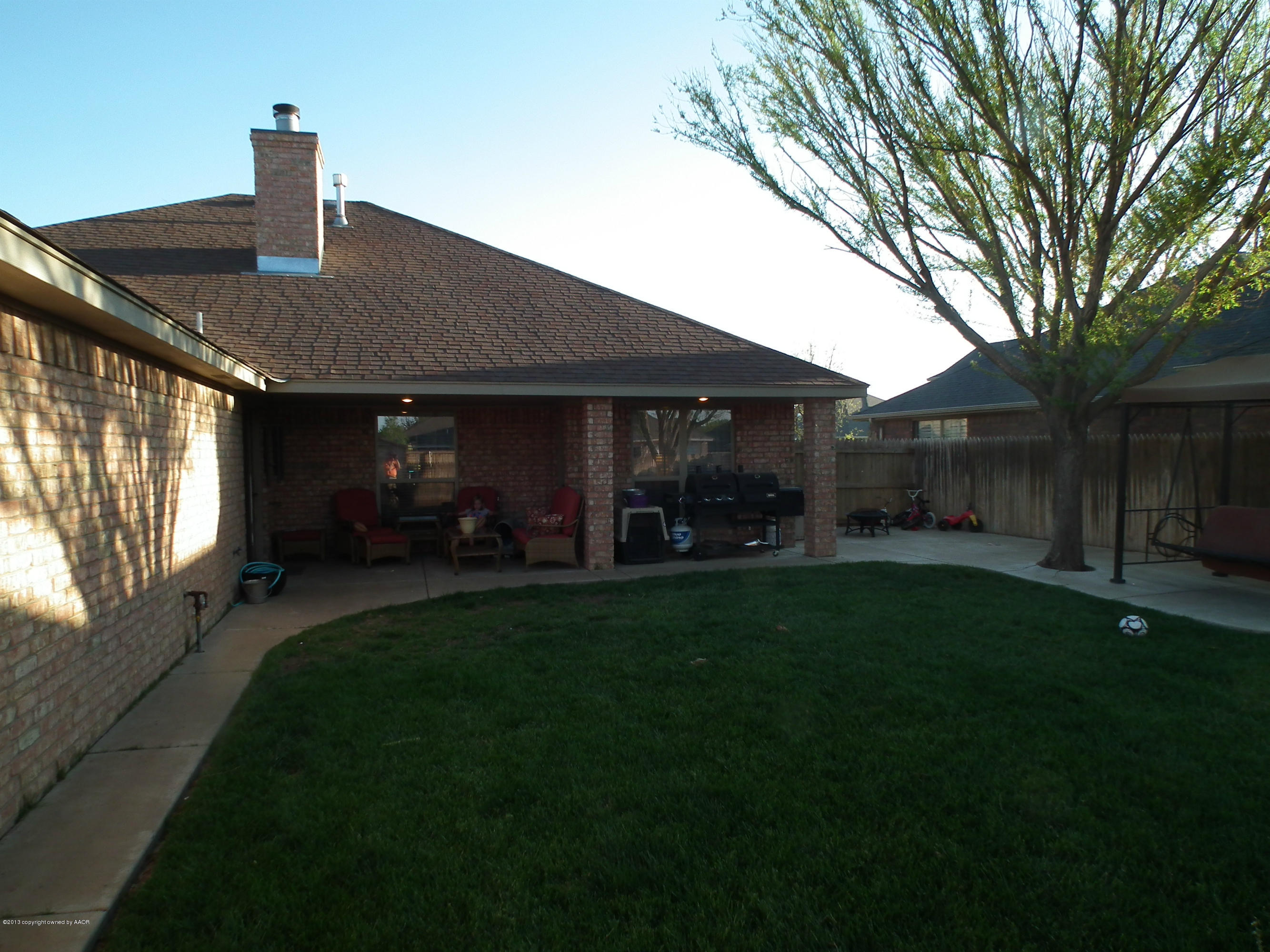 6804 Thunder Road Amarillo, TX 79119 - Photo 14 of 21 Back yard and covered patio