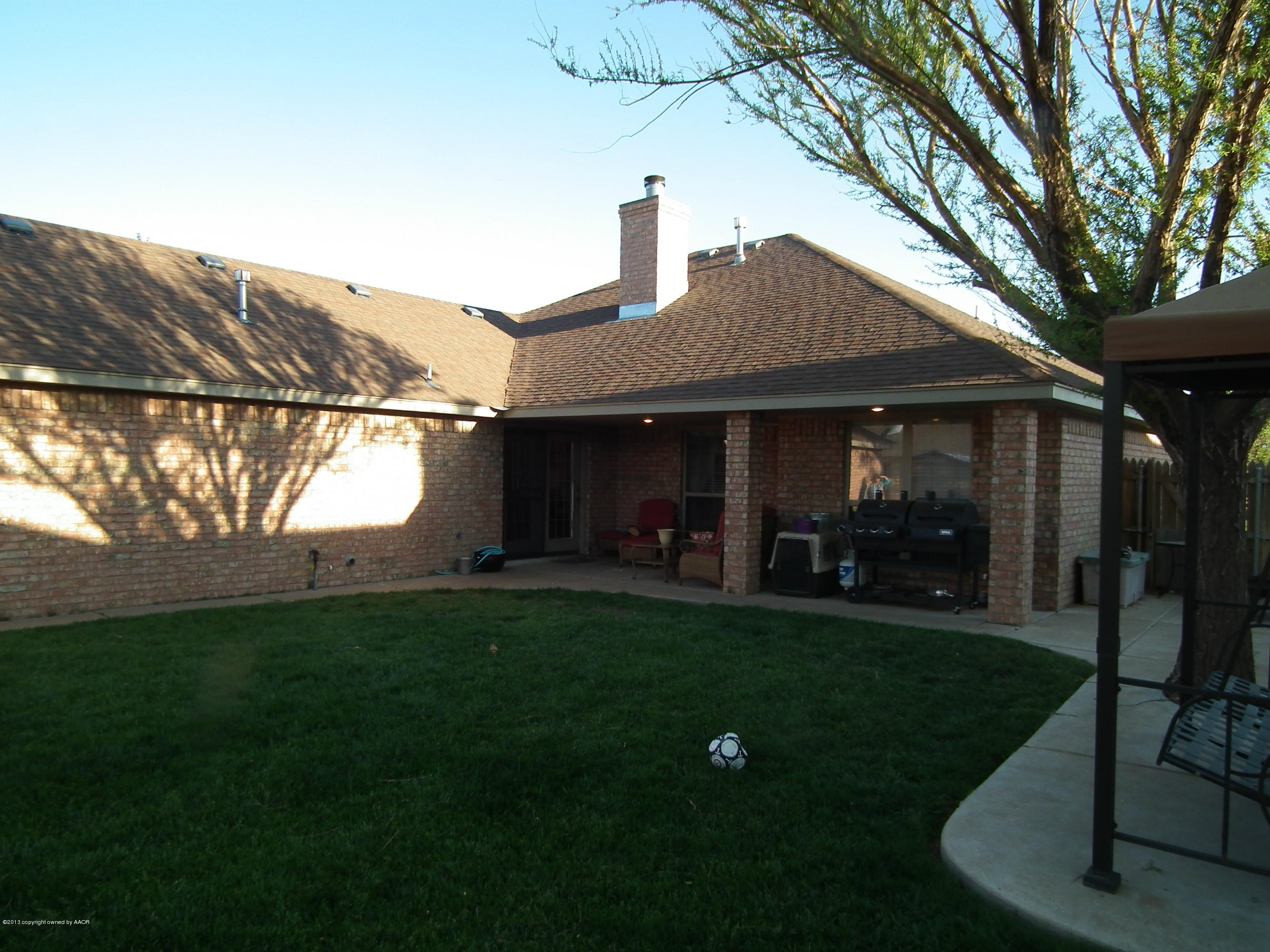 6804 Thunder Road Amarillo, TX 79119 - Photo 15 of 21 Back yard and covered patio