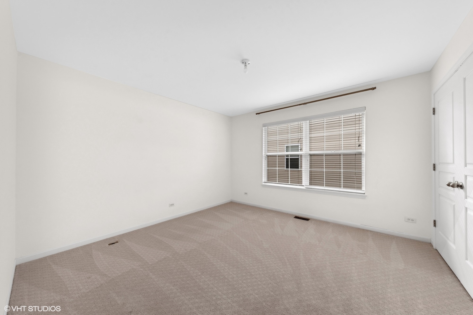 361 Minuet Circle Volo, IL 60073 - Photo 13 of 19 an empty room with a window