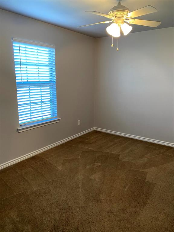 906 Parkplace Ridge Princeton, TX 75407 - Photo 2 of 31 Carpeted room featuring a ceiling fan with integrated lighting, a window with horizontal blinds, and baseboard molding