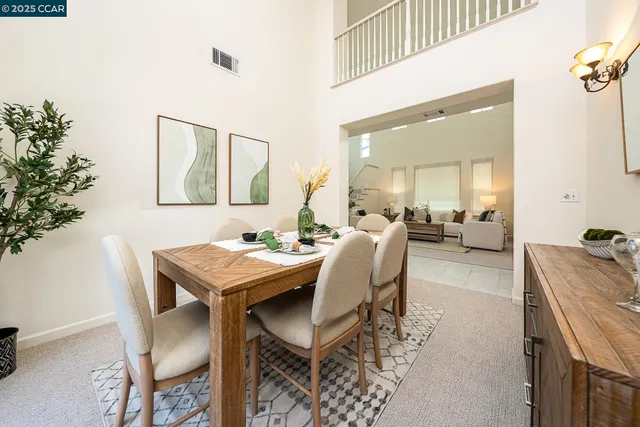 a view of a livingroom with furniture and window