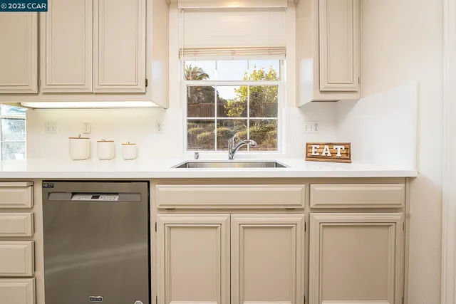 a picture of a dresser with a mirror