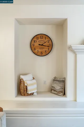 a front view of a lobby with wooden floor
