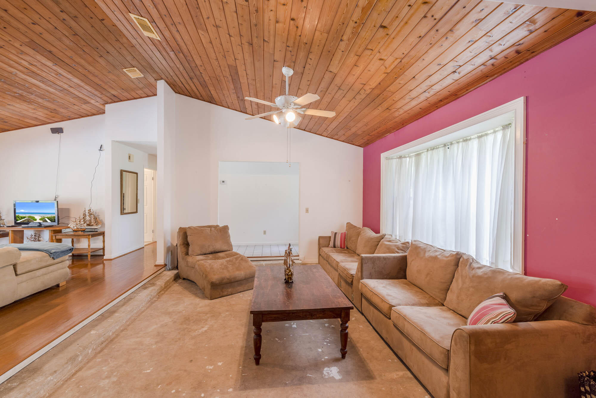 12355 Sandy Run Road Jupiter, FL 33478 - Photo 9 of 27 a living room with furniture and a large window