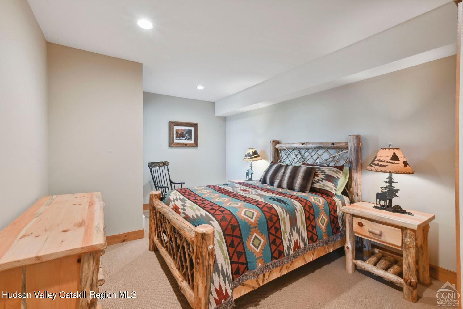 22 The Loop Windham, NY 12496 - Photo 31 of 64 a bedroom with a bed and a window