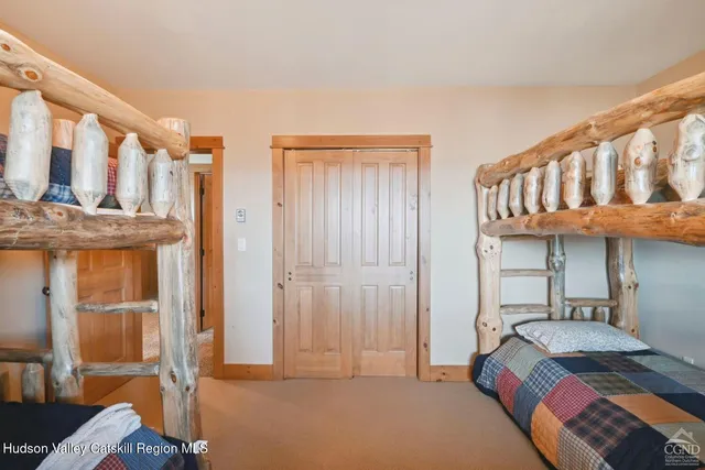 a view of an entryway with wooden walls