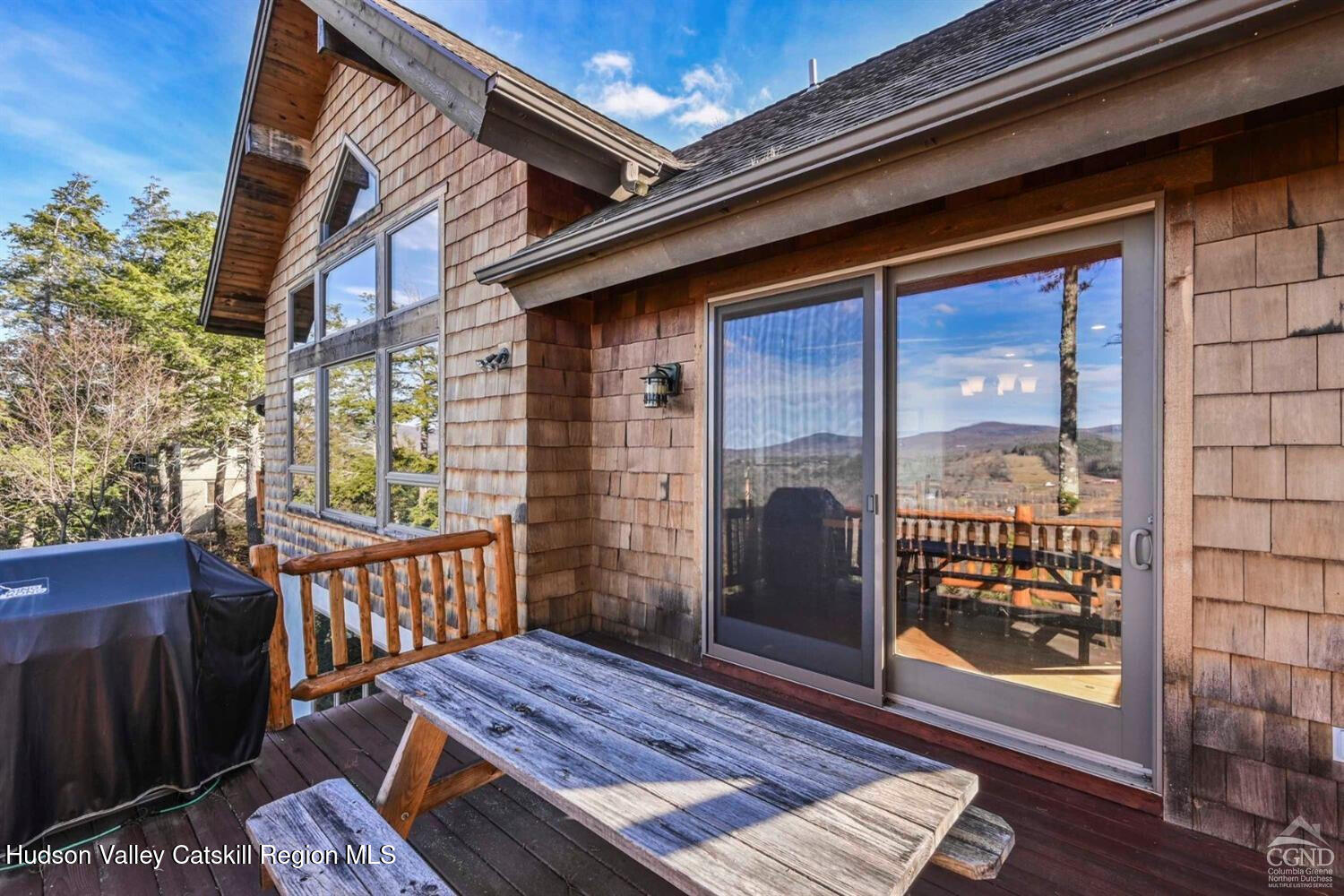 22 The Loop Windham, NY 12496 - Photo 48 of 64 a view of a balcony with wooden floor