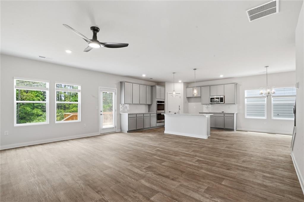 5351 Tolar Road South Fulton, GA 30213 - Photo 3 of 30 a view of kitchen with granite countertop cabinets and window