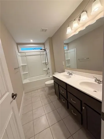a bathroom with a sink a vanity and a mirror