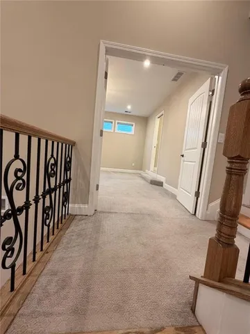 a bathroom with a sink a toilet and a shower