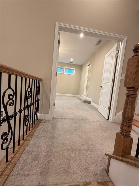 8040 Scenic Ridge Way Ball Ground, GA 30107 - Photo 23 of 35 a view of a hallway with windows