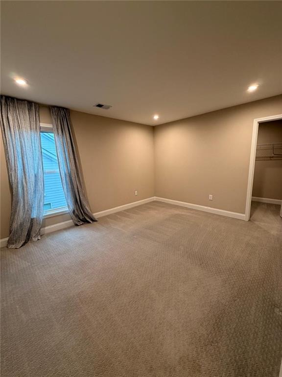8040 Scenic Ridge Way Ball Ground, GA 30107 - Photo 29 of 35 a view of an empty room