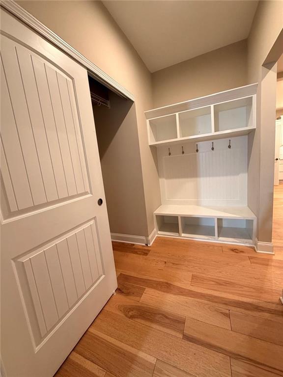 8040 Scenic Ridge Way Ball Ground, GA 30107 - Photo 31 of 35 a view of walk in closet with empty racks
