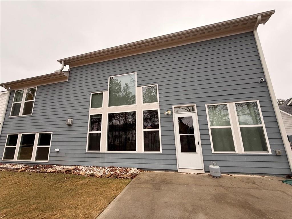 8040 Scenic Ridge Way Ball Ground, GA 30107 - Photo 35 of 35 a front view of a house