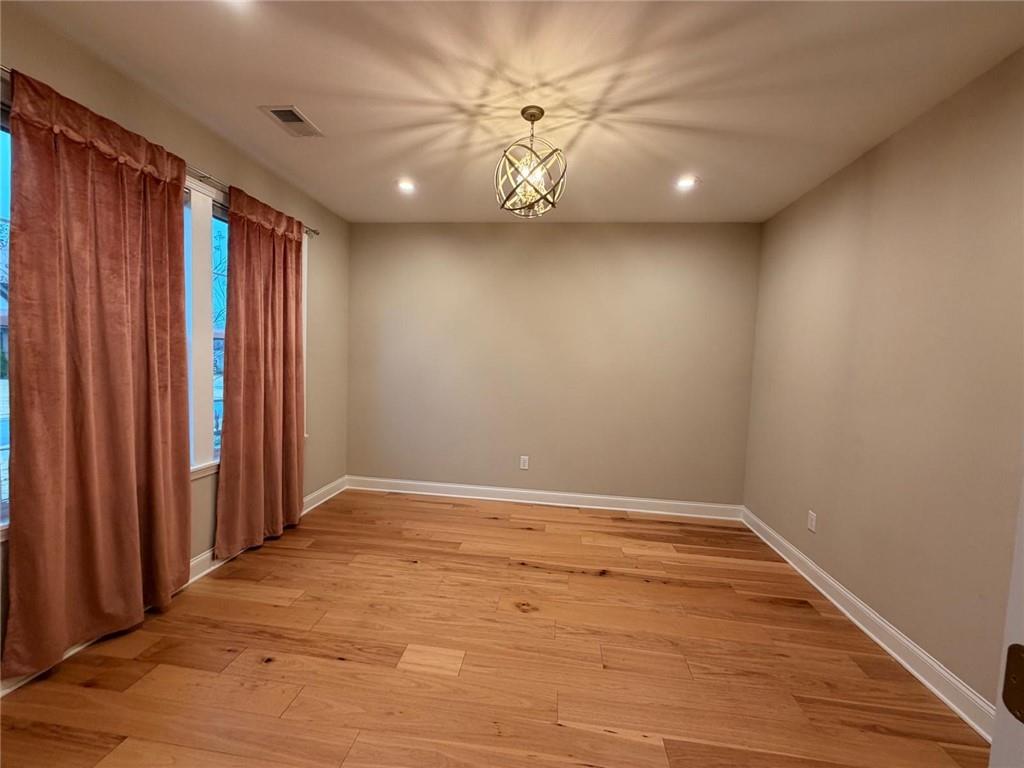 8040 Scenic Ridge Way Ball Ground, GA 30107 - Photo 5 of 35 wooden floor in an empty room