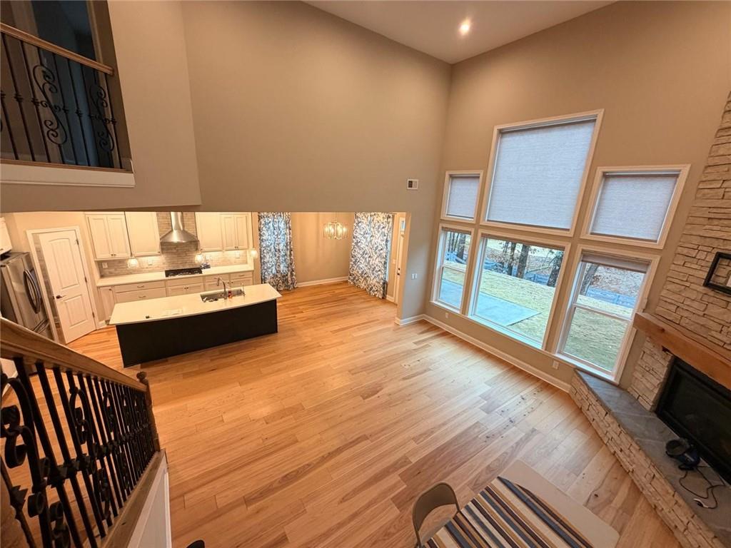 8040 Scenic Ridge Way Ball Ground, GA 30107 - Photo 7 of 35 a view of a living room and dining room
