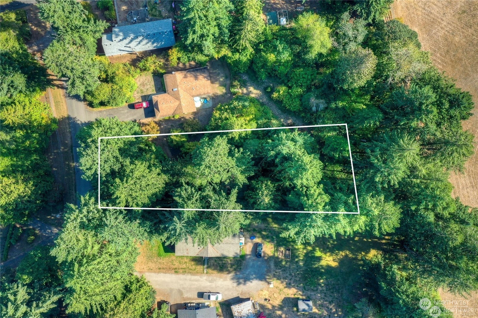 7349 Fair Oaks Road Southeast Olympia, WA 98513 - Photo 2 of 6 a view of a lake from a balcony