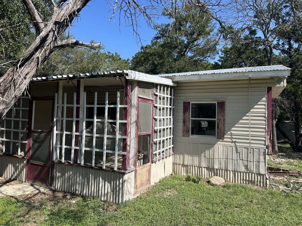 3 Quail Loop Belton, TX 76513 - Photo 11 of 12 a view of a house with a small yard and wooden floor and fence