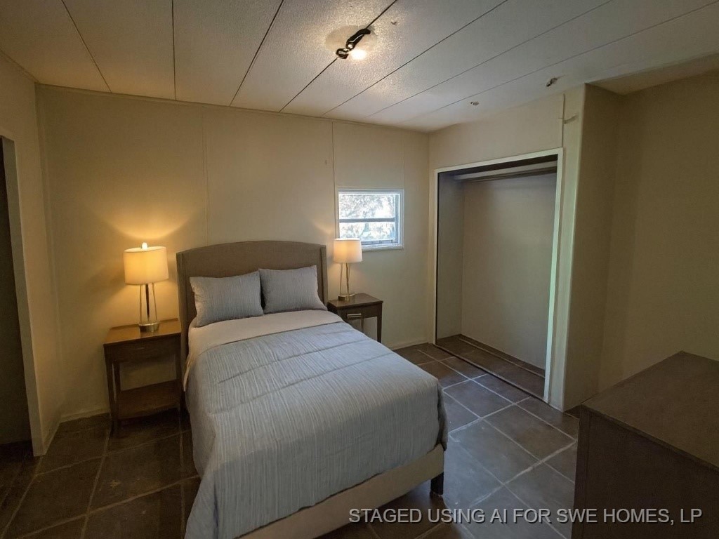 3 Quail Loop Belton, TX 76513 - Photo 9 of 12 a bedroom with a bed and a window