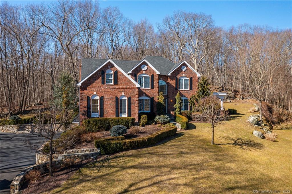 Welcome to 34 Equestrian Ridge-stunning grounds, meandering stone walls, slate walkways, and incredible space allow this home to breathe. Enjoy the 360 degree panoramic views!