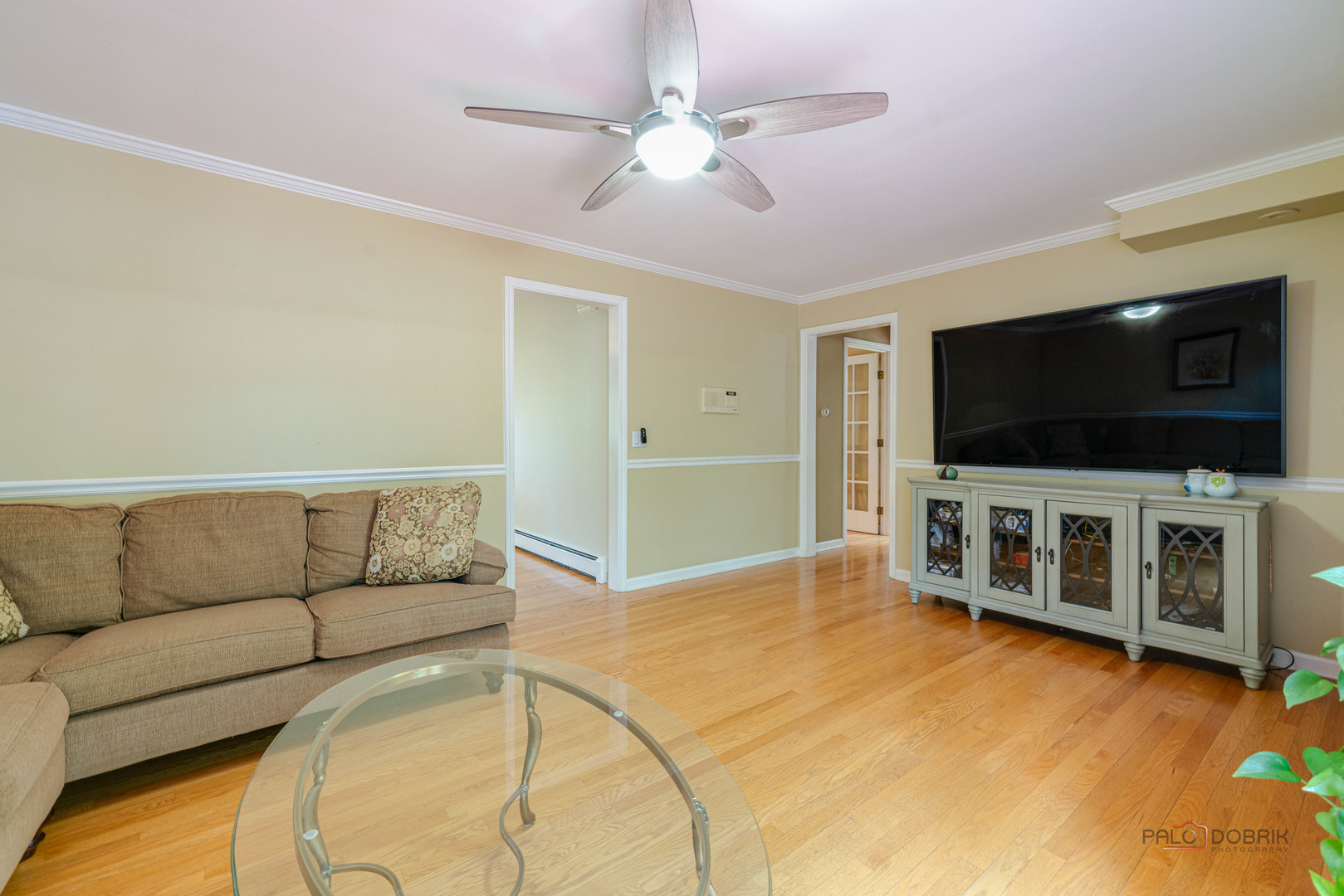 357 Roberts Road Inverness, IL 60010 - Photo 16 of 50 a living room with furniture and a flat screen tv