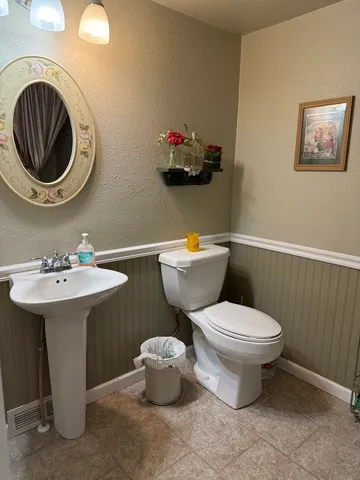 a view of a hallway with washer and dryer