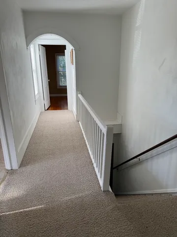 a view of entryway with kitchen