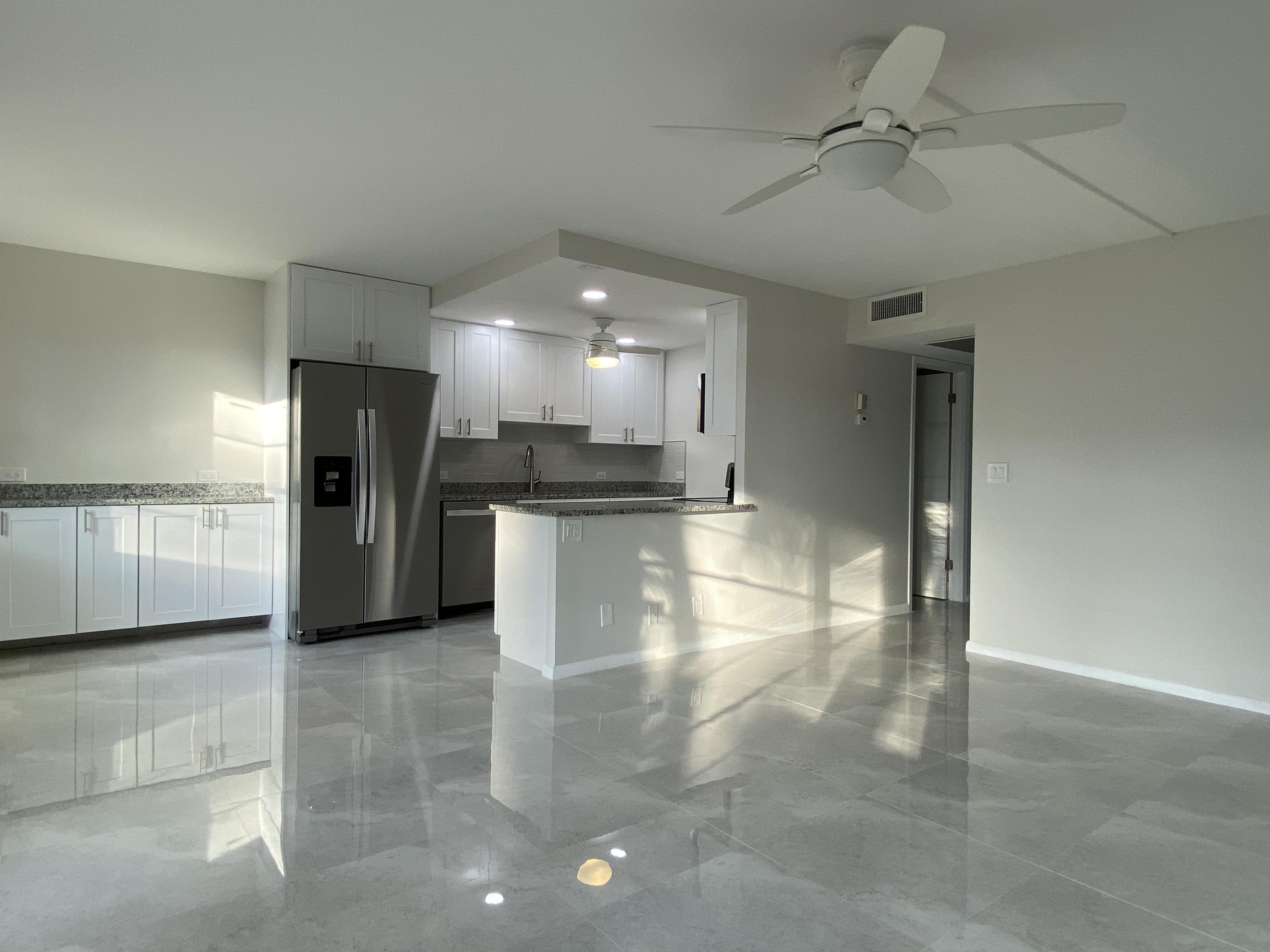 1024 Guildford East, Unit 1024 Boca Raton, FL 33434 - Photo 8 of 22 Kitchen and LivingArea
