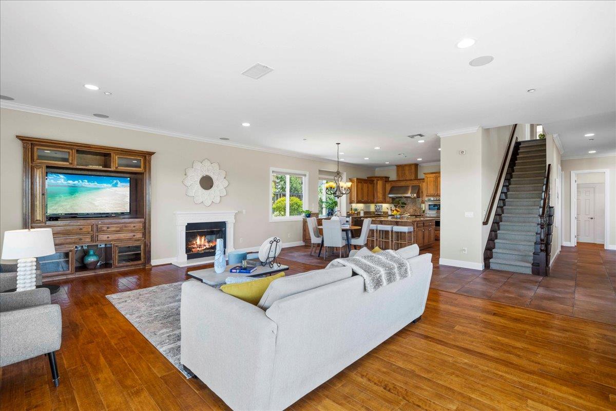 953 Winsford Court San Ramon, CA 94583 - Photo 17 of 73 a living room with fireplace furniture and a flat screen tv