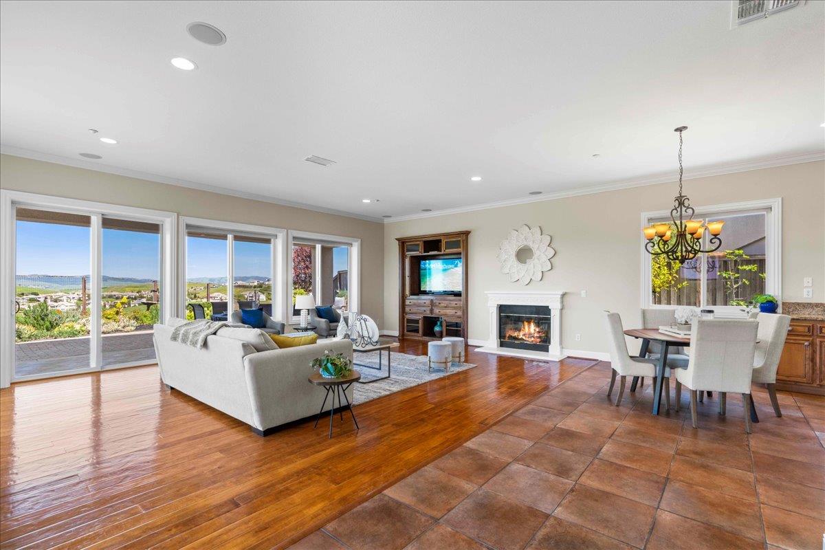 953 Winsford Court San Ramon, CA 94583 - Photo 18 of 73 a living room with fireplace furniture and a wooden floor