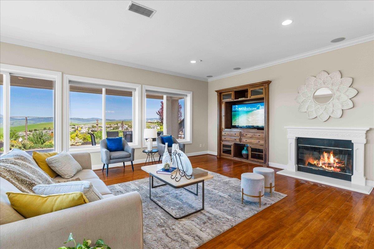 953 Winsford Court San Ramon, CA 94583 - Photo 19 of 73 a living room with furniture fireplace and a large window