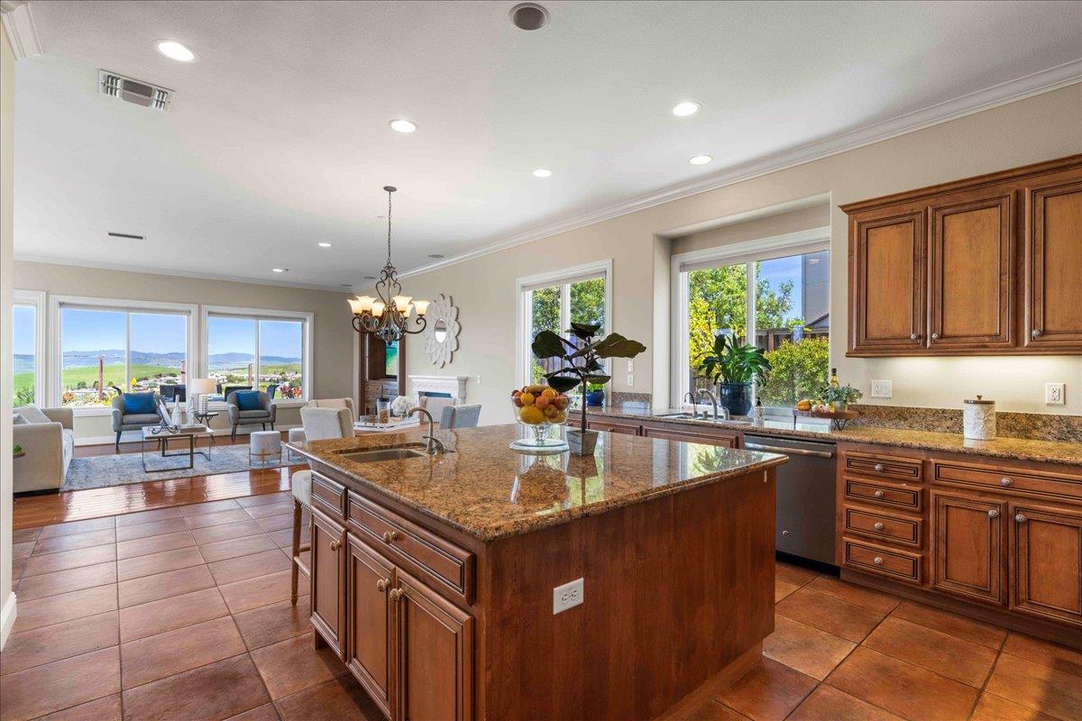 953 Winsford Court San Ramon, CA 94583 - Photo 24 of 73 a view of kitchen island a sink and living room