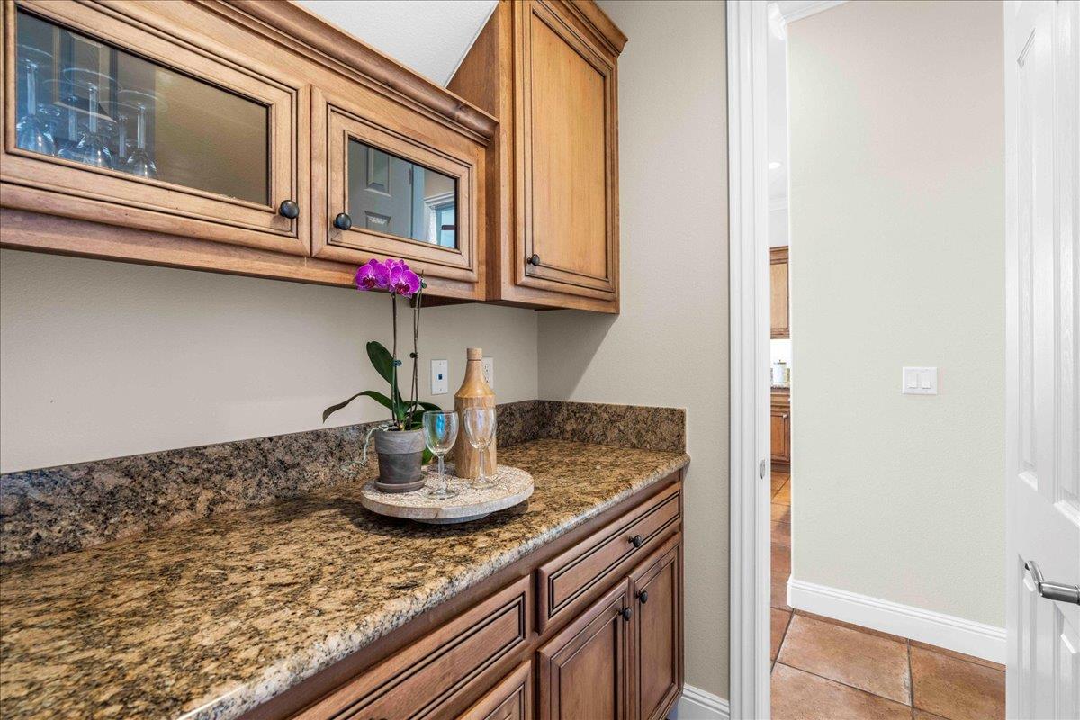 953 Winsford Court San Ramon, CA 94583 - Photo 25 of 73 a kitchen with stainless steel appliances granite countertop a sink and cabinets