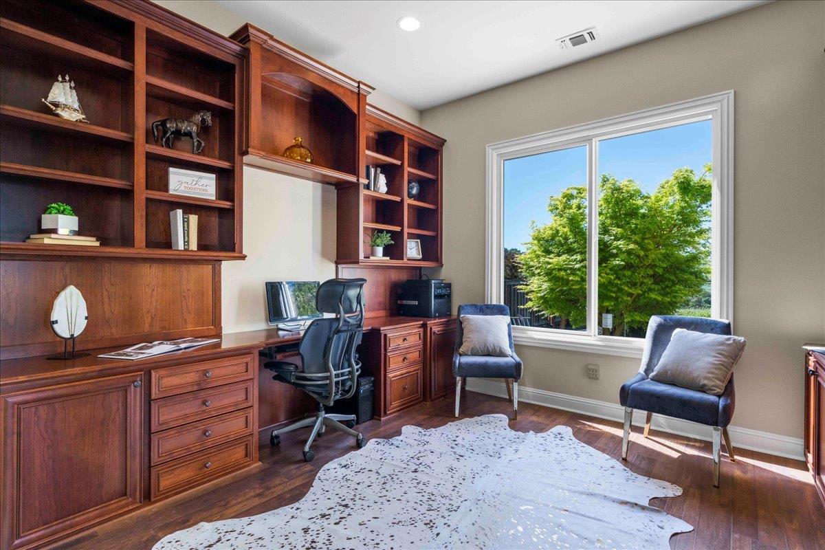 953 Winsford Court San Ramon, CA 94583 - Photo 28 of 73 a view of a workspace with furniture and a bookshelf